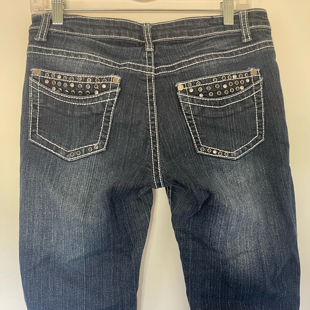 Y2K unique distressed bootcut jeans with studded details